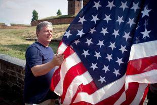 Larry Elliott of Baltimore is flying a flag over Fort McHenry. Larry’s father was a WWII veteran and this flag was presented to the family at the funeral.  It was touching to witness him honoring his father’s memory this way.