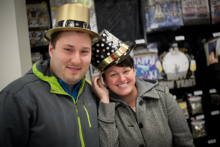 Steven and Mallory Miller from St. Louis, MO are in Peoria to celebrate the New Year 
with friends. They are picking up a few party favors at Party City.
