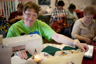 Barbara Shiverdecker is the local Chapter Coordinator for Project Linus which provides love, security,
 warmth and comfort to seriously ill or traumatized children through handmade blankets.
 She wanted to thank Jones Sewing Machine Company for providing equipment and space for the group.