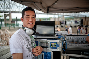 Pedro DeLeon of Peoria works as DJ for Fiesta En El Rio on the Peoria Riverfront.