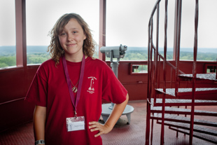Janessa Lockwood from Peoria Heights, a Home-Schooled Sophomore, is one of the elevator operators at Peoria Heights Observation Tower.  She likes her job but, with a little prodding admitted, it has its ups and downs.