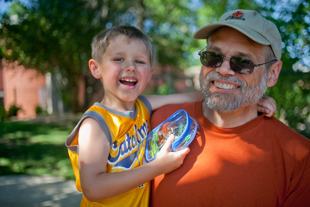 Don Klemme and his 5 year old grandson Kyler Mann, both from Bloomington IL, are spending father’s day at the Peoria Zoo.
  Don loves spending time with Kyler and Kyler loves animals. Kyler said 'this was my best day ever'.