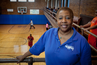 Deborah Totten calls herself a park rat. She would come to the pool at Proctor Recreation Center as a young girl, then became a lifeguard at age 14 and was away long enough to go to College and Grad School. ‘I grew up here’ she said. She has been in leadership in the park district for 36 years. Proctor is celebrating its 100th anniversary.