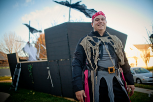 Doug Fauth and his family have a theme for the Trick-or-treaters every year. This year the theme is Pirates of the Caribbean.  
It took three and a half weeks to build the pirate ship in his front yard. It is 24 feet long, has cannons that flash and smoke.