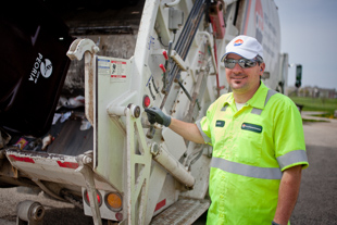Scott Brady has driven a garbage truck for 6 years. ‘It is a job that needs to be done’ 
he said, ‘I take pride in helping to keep Peoria clean’.