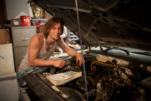 Corry Weller is rebuilding a Chevy S10 in his family garage. He is 17 and knows how to weld and is looking for work.