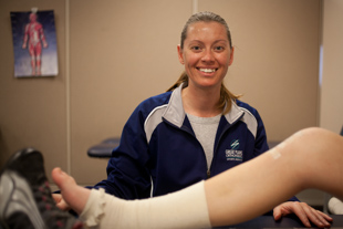 Cathy Wells is a Physical Therapist Assistant and a Sports Trainer. She has always been interested 
in sports and played sports in school. She said sports medicine was a natural fit for her.