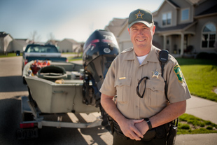 Scott Avery is the only Conservation Officer in Peoria County.  He grew up in southern Illinois, ‘I was a farm boy’, he said ‘always hunting and fishing with my dad.’  The job is more than ‘game warden’, with duties that include Homeland Security, rescuing flood victims, teaching safety classes, etc.,  ‘every three months or so it changes’ he said.