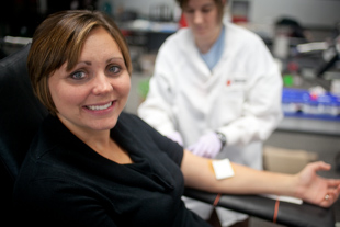 Lynn Rowe from Henry, IL is participating at her company Blood Drive.  She works at Advanced Technology 
Services as a financial analyst.  They have a blood drive every couple of months. 
Lynn gives every time, ‘it is not a difficult thing to do and it helps people’.