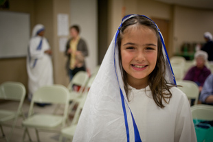 Gianna Vitale, a 4th grader at St. Jude Catholic School in Dunlap, played the role of Mother Theresa in her school play. 
She said it was fun writing and performing the play with her class mates, but the hardest part of portraying 
the most famous and beloved woman of the 20th Century… ‘memorizing my lines’.