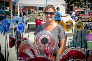 Angela Angle from Metamora is at her booth at The RiverFront Market called ‘Iris Eyes’.
 Angela creates beautiful garden sun catchers.
