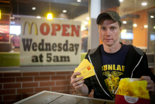 Justin Locher camped out in his truck with friends starting at 11 p. m. in order to be 3rd in line for the opening of the new McDonalds in Dunlap. The first 100 people got free French fries for a year. He said they had a lot of fun but did not sleep.