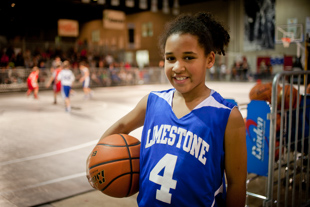 Jada Lane is a third grader and plays on a 5th and 6th grade AYBT basketball team.  Her team played during Peoria’s
 March Madness Experience and won.  She said she likes playing basketball, ‘because it’s fun.’